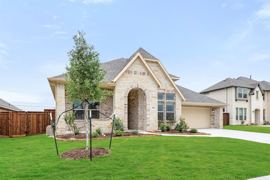 Front exterior of a new home in Somerset, Venus, TX, highlighting curb appeal (Image 19).