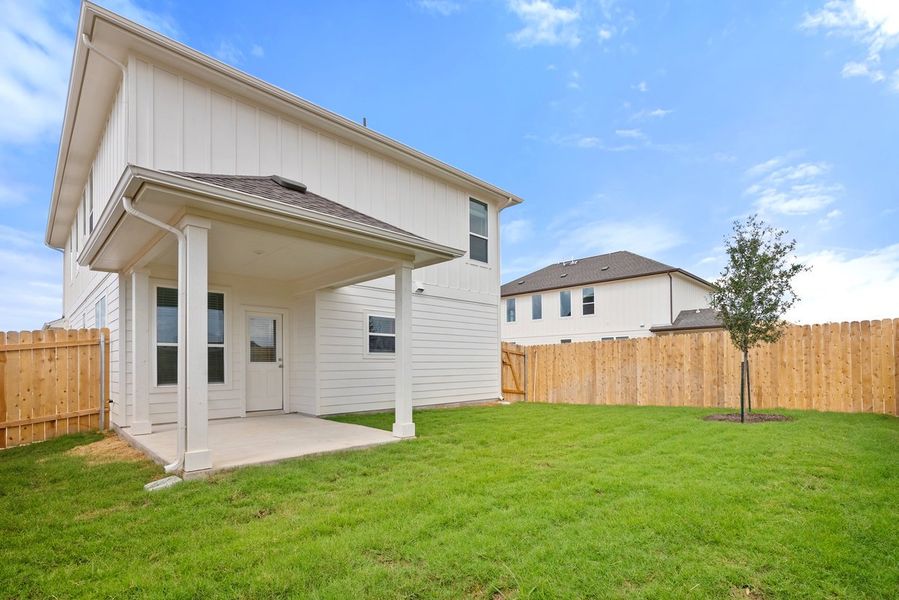 Exterior details and patio area of a home in Porter Country, Buda (Image 19).