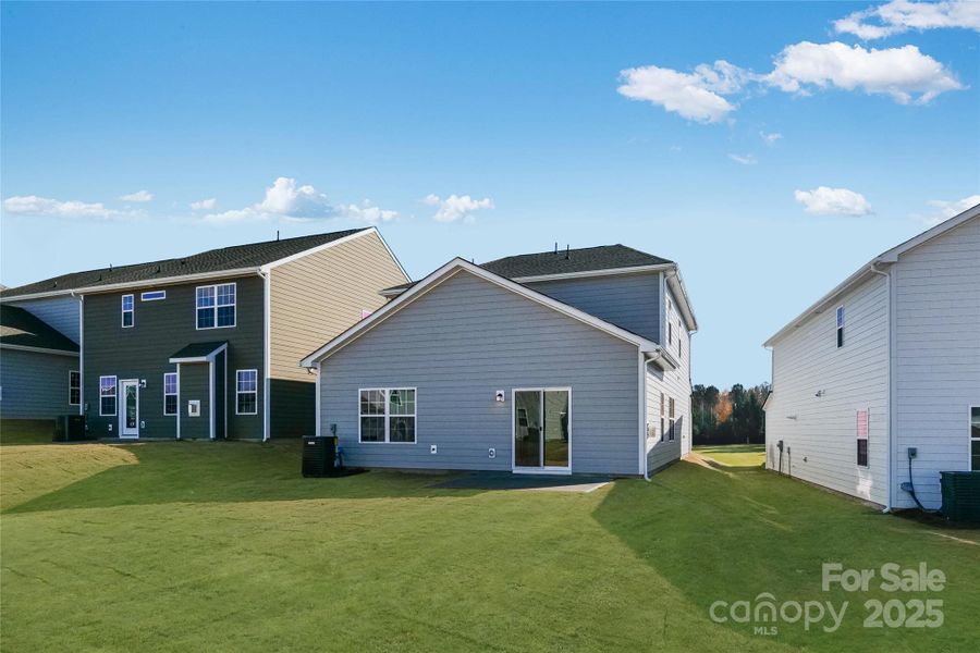 Exterior details and patio area of a home in Redhawk: Walk, Belmont (Image 3).