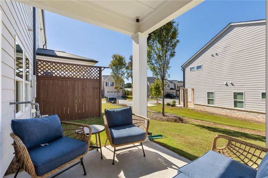 Exterior details and patio area of a home in Willowcrest Townhomes, Mableton (Image 3).