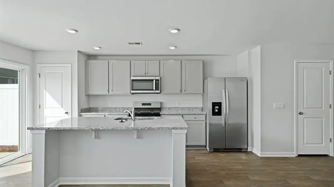 Furnished interior view inside a new home in Pine Hills Townhomes at Cane Bay, Summerville (Image 2). Furnished interior view inside a new home in Pine Hills Townhomes at Cane Bay, Summerville (Image 2).