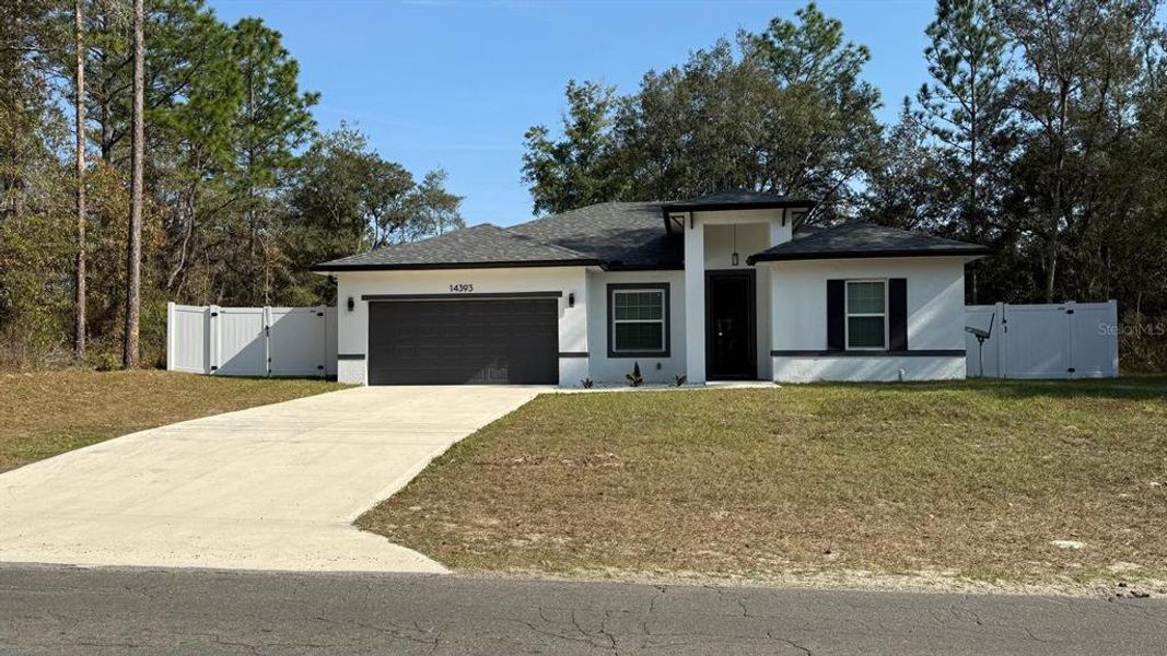 Front exterior of a new home in , Ocala, FL, highlighting curb appeal (Image 2).