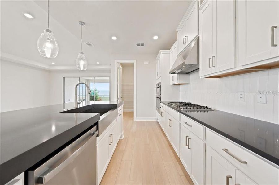 Furnished interior view inside a new home in Coasterra Community Group Page, Palmetto (Image 10).