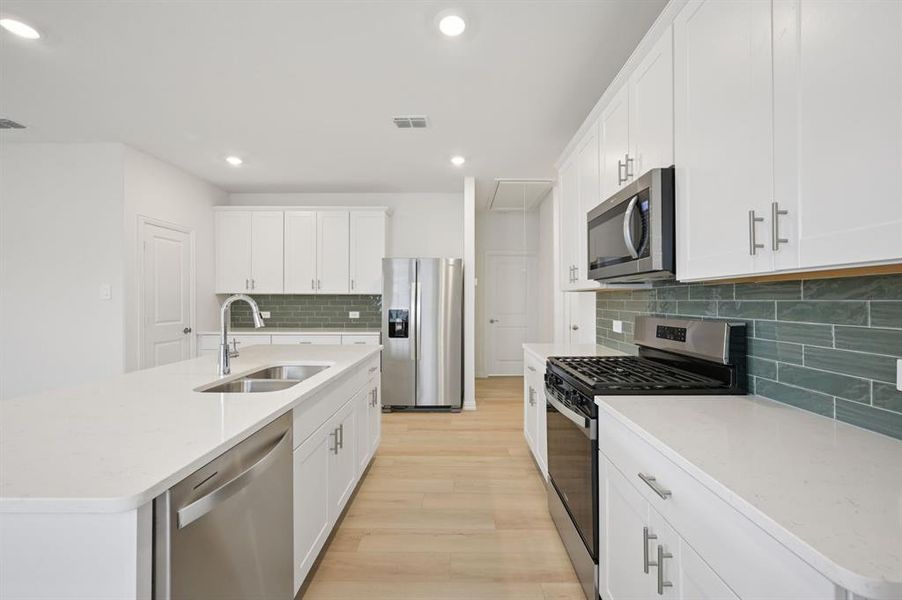 Photo is not of the actual home, but is an inspirational photo of builder’s model home and may depict options, furnishings, and/or decorator features that are not included.