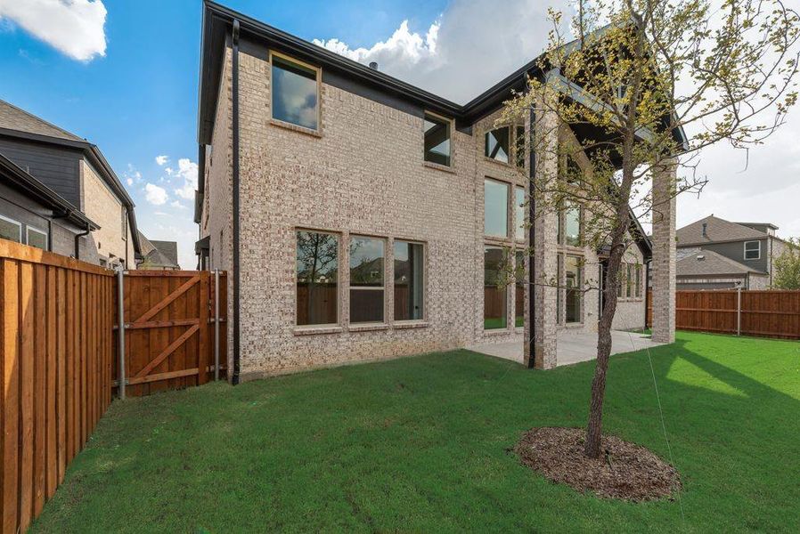 Front exterior of a new home in Lake Forest, McKinney, TX, highlighting curb appeal (Image 17).