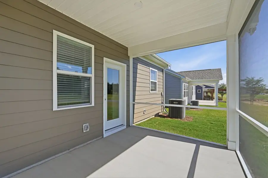 Exterior details and patio area of a home in Esplanade at Northgate, Indian Trail (Image 4).