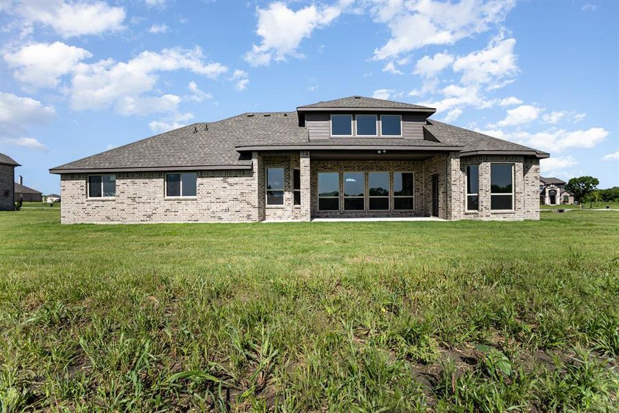 Front exterior of a new home in , Waxahachie, TX, highlighting curb appeal (Image 18).
