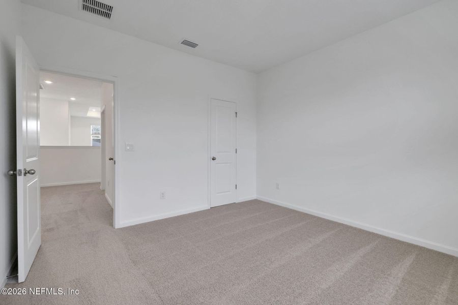 Spacious, unfurnished interior of a new home in The Hammock at Palm Harbor, Palm Coast (Image 29).