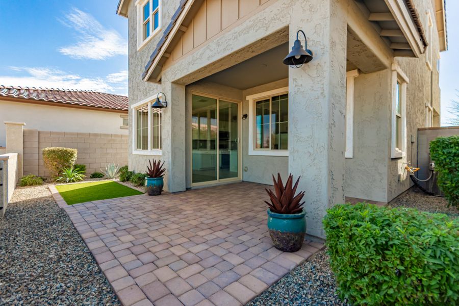 Exterior details and patio area of a home in Eastmark, Mesa (Image 3).
