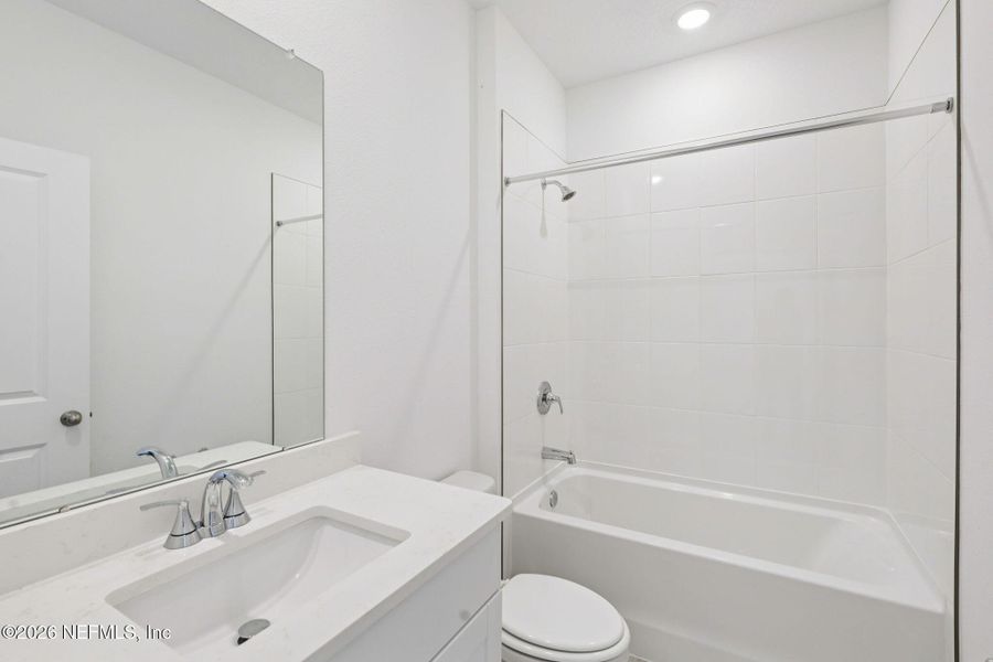 Furnished interior view inside a new home in Lakes at Bella Lago - Signature Series, Green Cove Springs (Image 10).