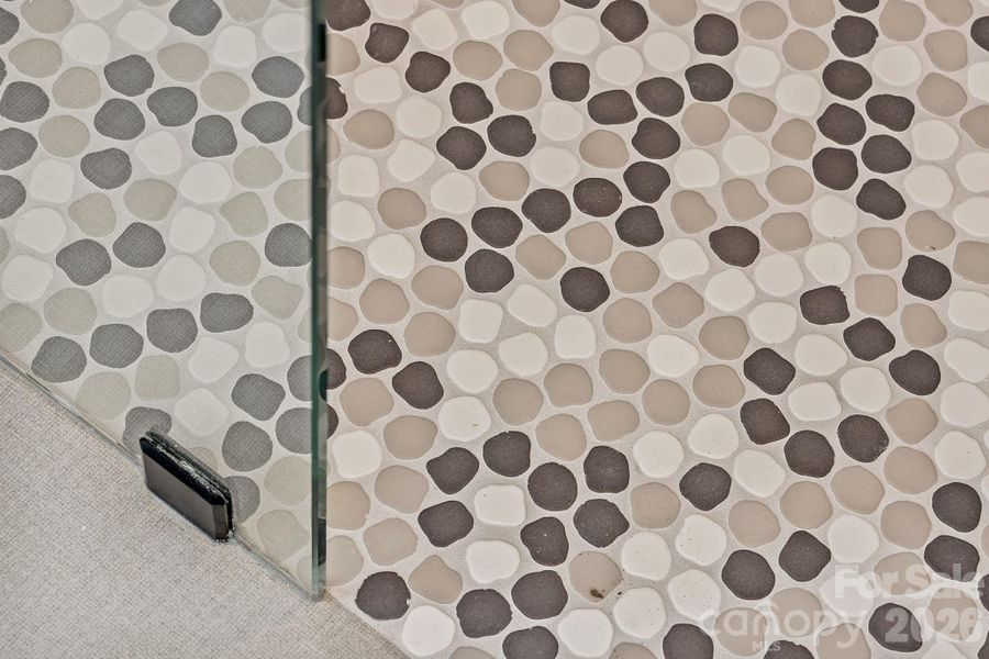 Custom Tiled Flooring in the Primary Shower