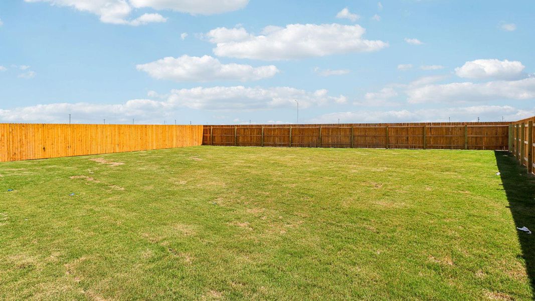 Exterior details and patio area of a home in Monarch Ranch, Manor (Image 3).