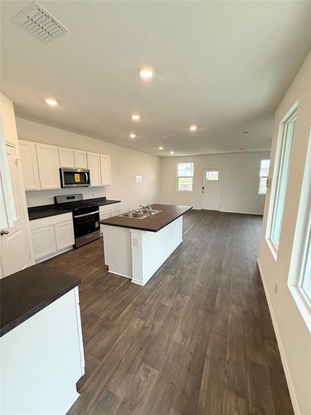 Furnished interior view inside a new home in Valverde, Bastrop (Image 9).