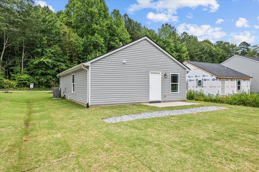 Representative exterior photo of a completed home built from the Elliott by Enchanted Homes in Gentry Place, Spartanburg, SC (Image 12).