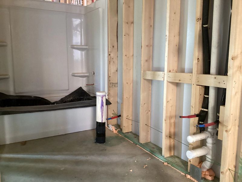 In-progress construction of a new home in The Homestead at Lariat, Liberty Hill, TX (Image 12).