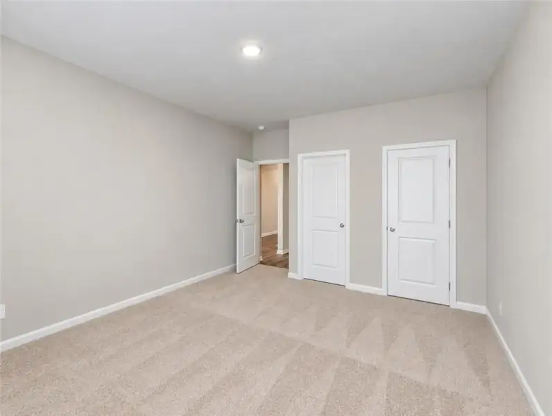 Spacious, unfurnished interior of a new home in Kingsmere Estates, Loganville (Image 31).