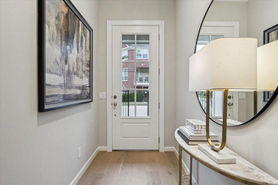 Welcoming entry featuring high ceilings and designer finishes throughout. Welcoming entry featuring high ceilings and designer finishes throughout.