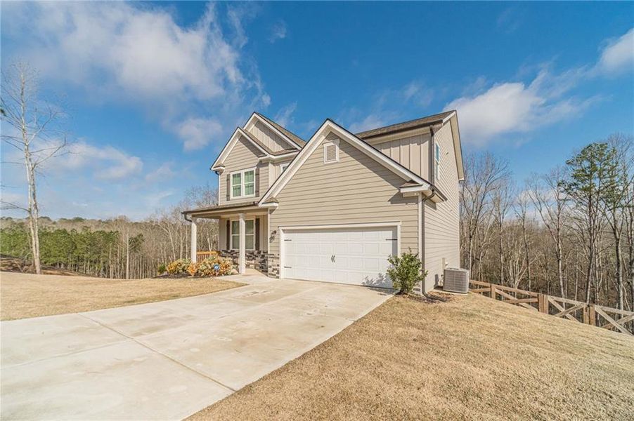 Front exterior of a new home in Alcovy Estates, Monroe, GA, highlighting curb appeal (Image 20).