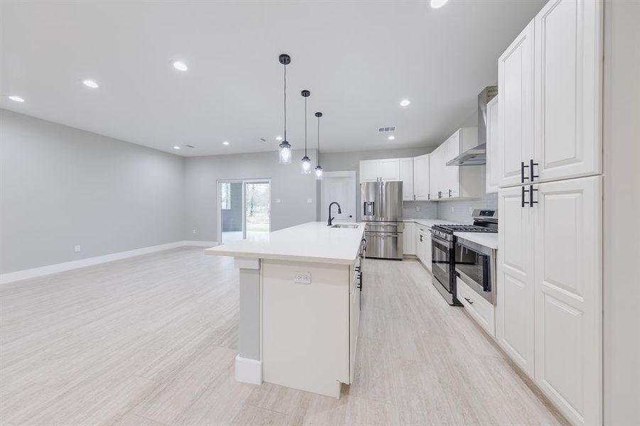 Dining room seamlessly opens to the kitchen, creating a perfect flow for entertaining and family gatherings.