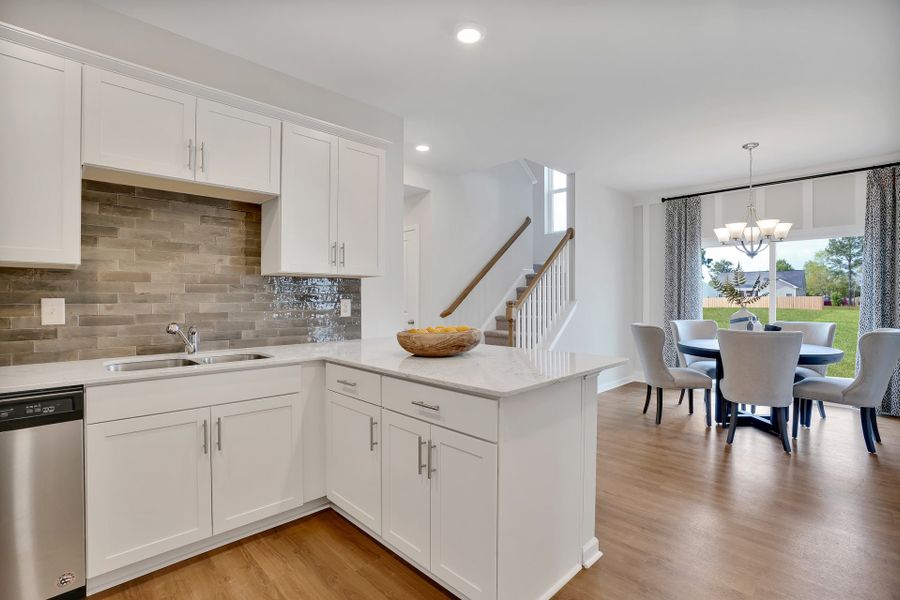 Representative furnished interior of a home built from the Joyner by McKee Homes in The Walk at East Village, Clayton (Image 7). Representative furnished interior of a home built from the Joyner by McKee Homes in The Walk at East Village, Clayton (Image 7).