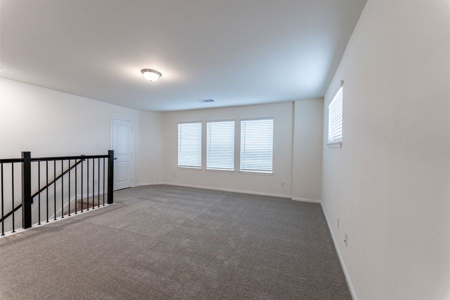 Spacious, unfurnished interior of a new home in Windrose Green, Angleton (Image 21).