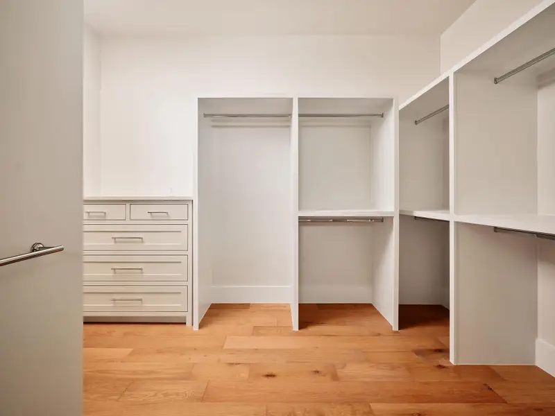 Custom closet system with built-in drawers provides abundant storage and organization. Custom closet system with built-in drawers provides abundant storage and organization.