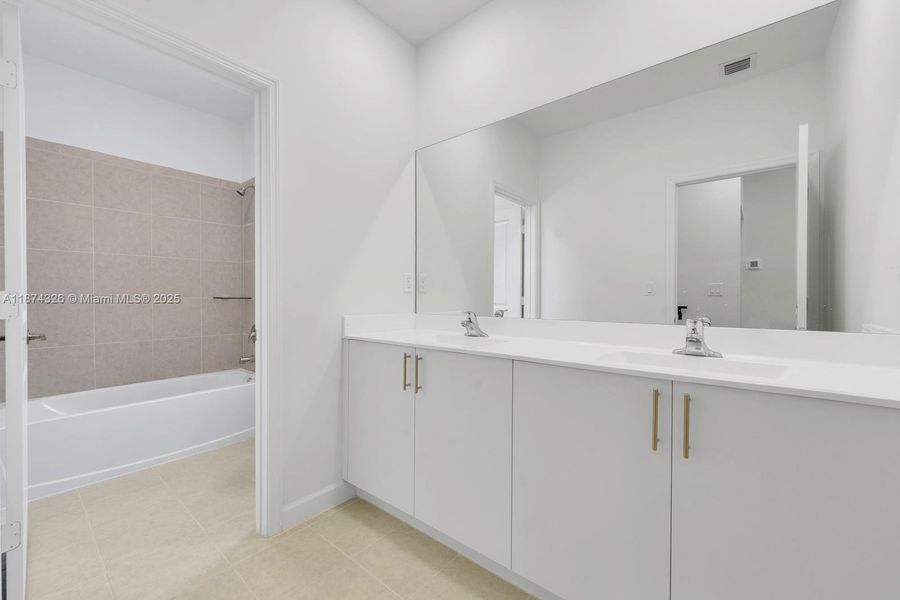 Furnished interior view inside a new home in , Miami (Image 14). Furnished interior view inside a new home in , Miami (Image 14).