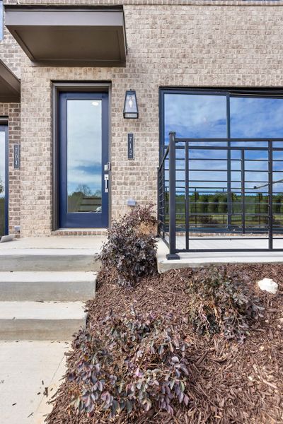 Exterior details and patio area of a home in Echo Park, Suwanee (Image 24).