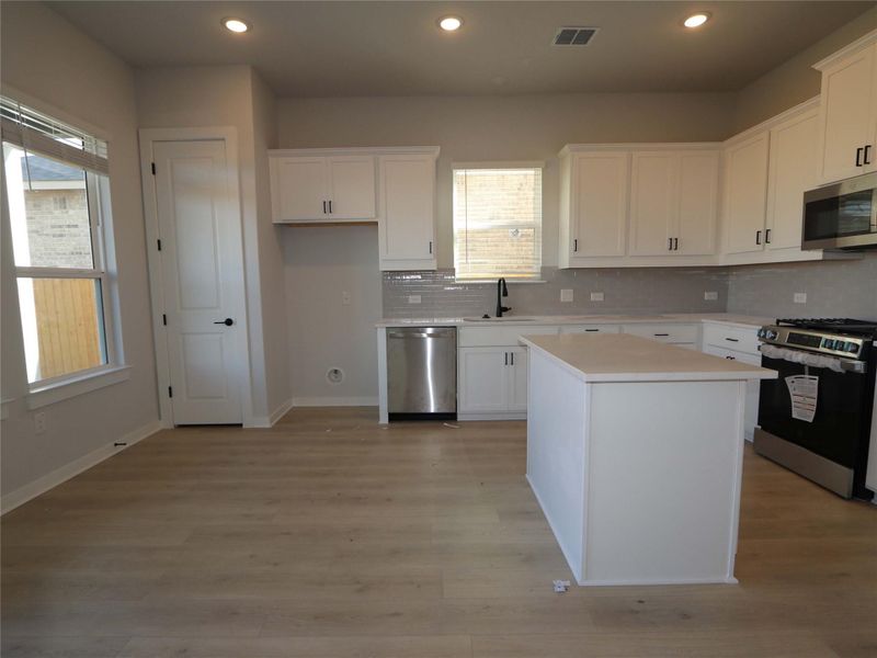 Furnished interior view inside a new home in Estancia West, Manchaca (Image 9).