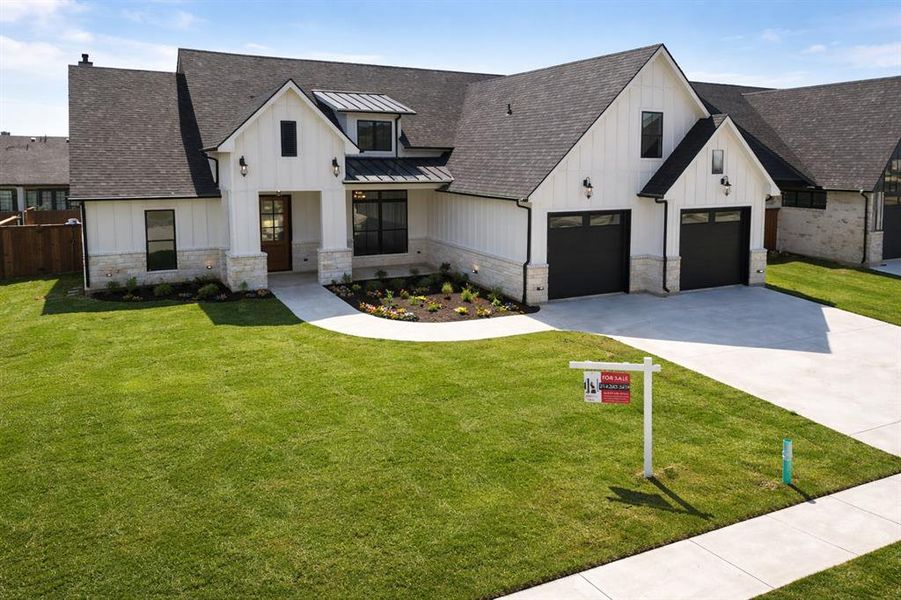 Front exterior of a new home in , Pottsboro, TX, highlighting curb appeal (Image 28).