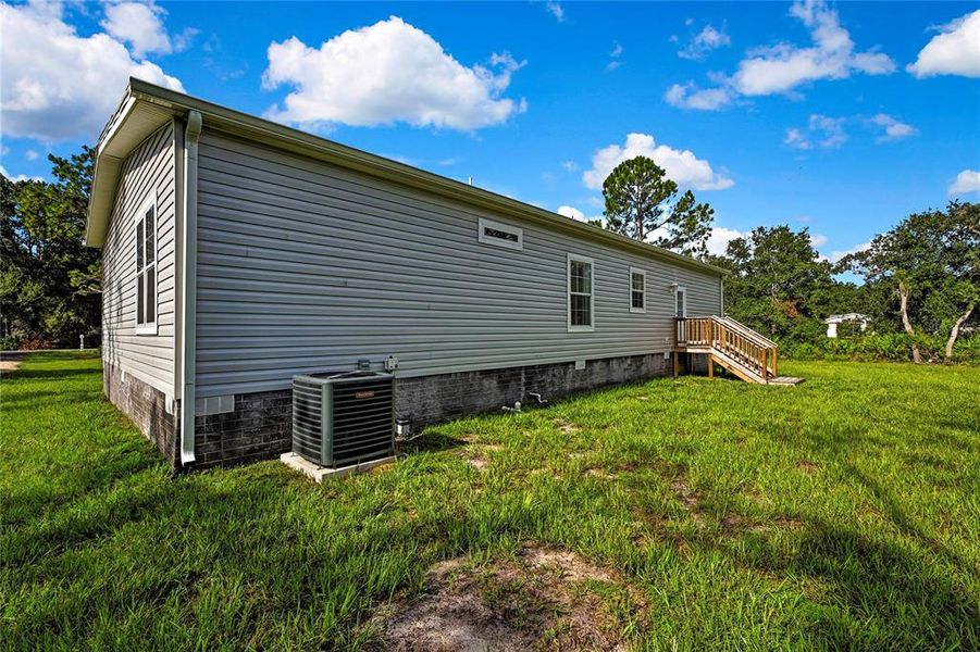 Front exterior of a new home in , Homosassa, FL, highlighting curb appeal (Image 29).