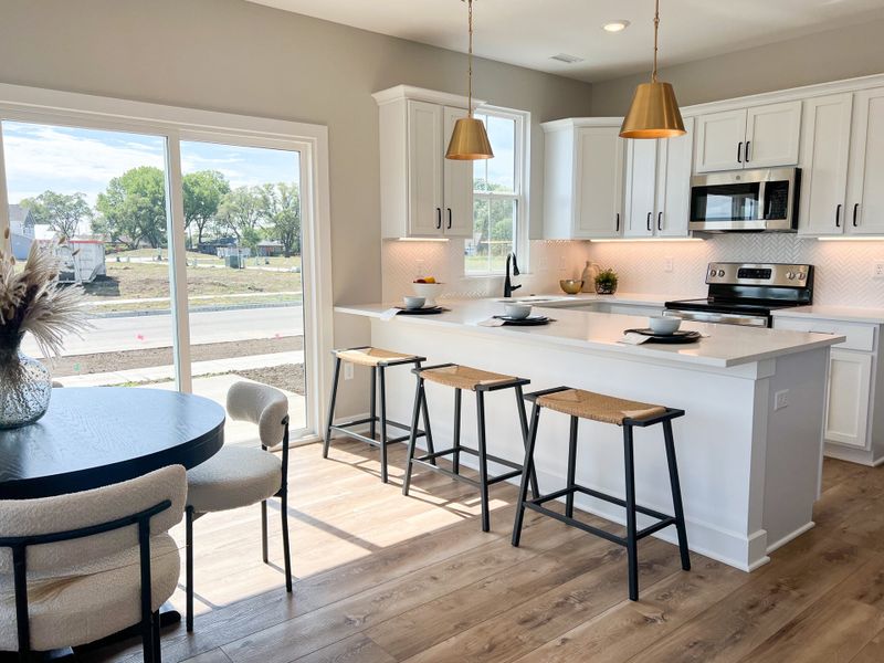 Representative furnished interior of a home built from the Sawgrass by Perfection Builders in Heritage Commons, Andover (Image 3).