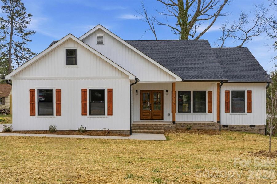 Front exterior of a new home in , Hickory, NC, highlighting curb appeal (Image 18).