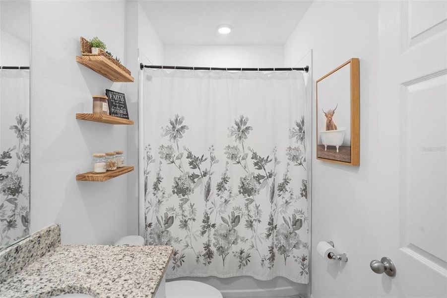 Furnished interior view inside a new home in Deer Run at Crosswinds, Davenport (Image 7).