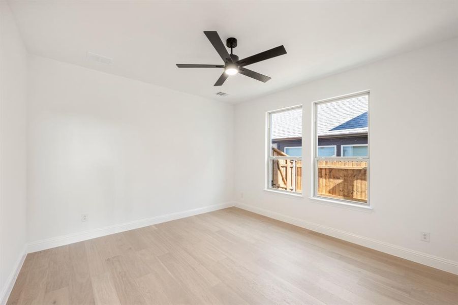 Spacious, unfurnished interior of a new home in Willow Wood Classic 50, McKinney (Image 29).