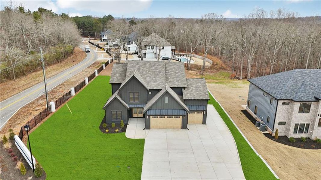 Front exterior of a new home in , Auburn, GA, highlighting curb appeal (Image 49).