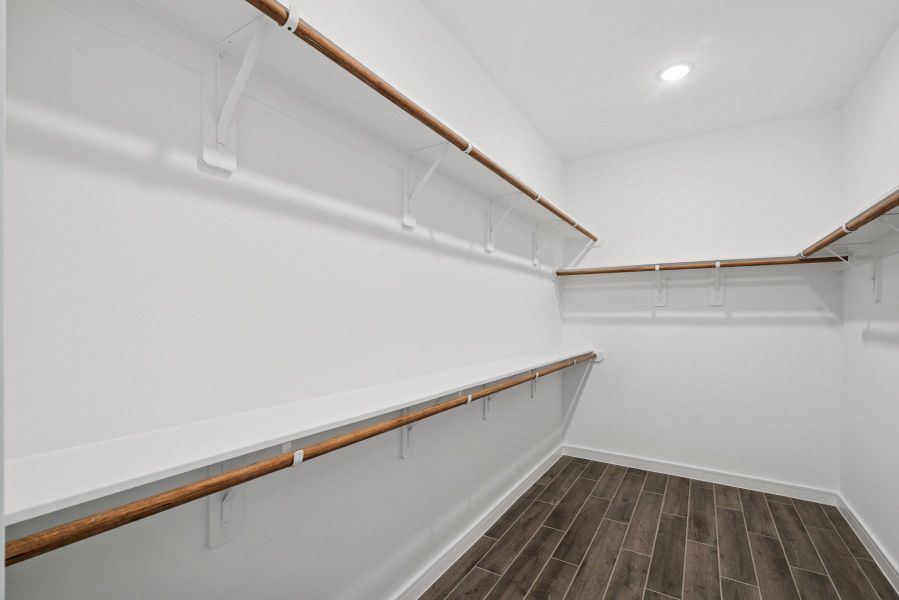 Walk-in closet in the primary suite Walk-in closet in the primary suite