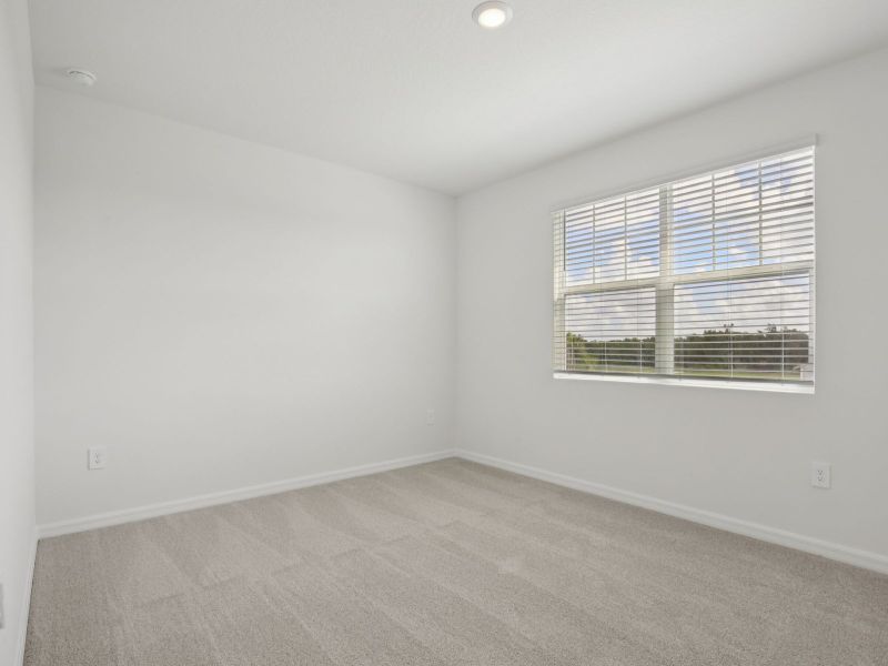 Spacious, unfurnished interior of a new home in Coasterra - Reserve Series, Palmetto (Image 15).