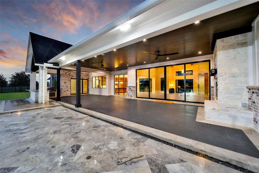 Keep warm during the cooler months with two outdoor heaters over the covered patio and a gas/wood outdoor fireplace.