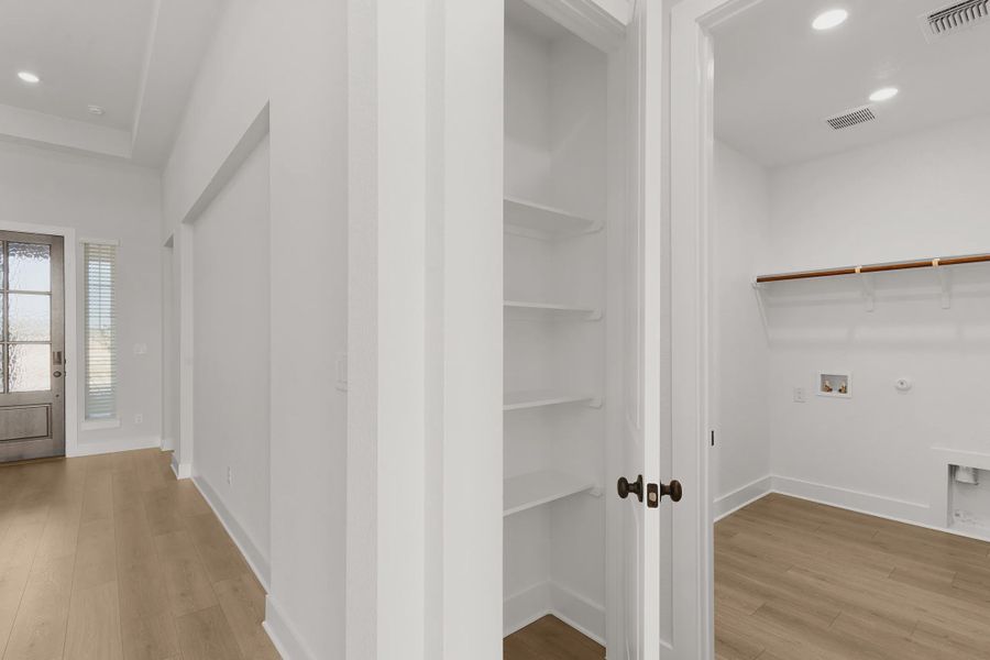 Representative unfurnished interior of a home built from the Barron by Chesmar Homes in Lariat, Liberty Hill (Image 24).
