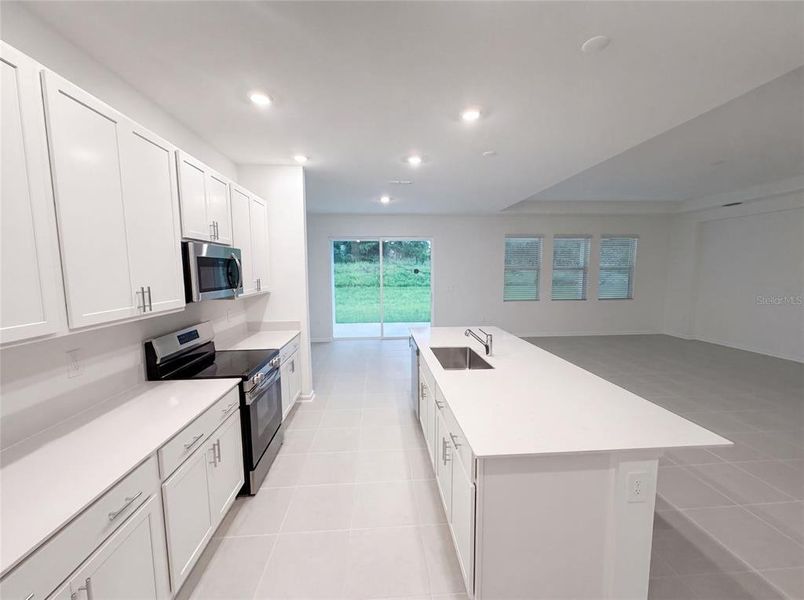 Furnished interior view inside a new home in Meadow Pointe, Groveland (Image 5).