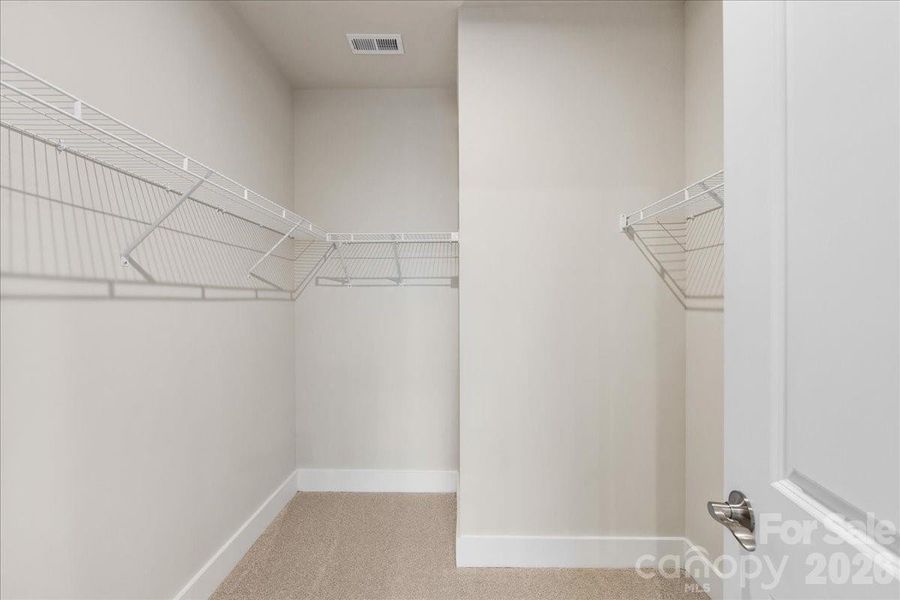 Primary walk-in closet