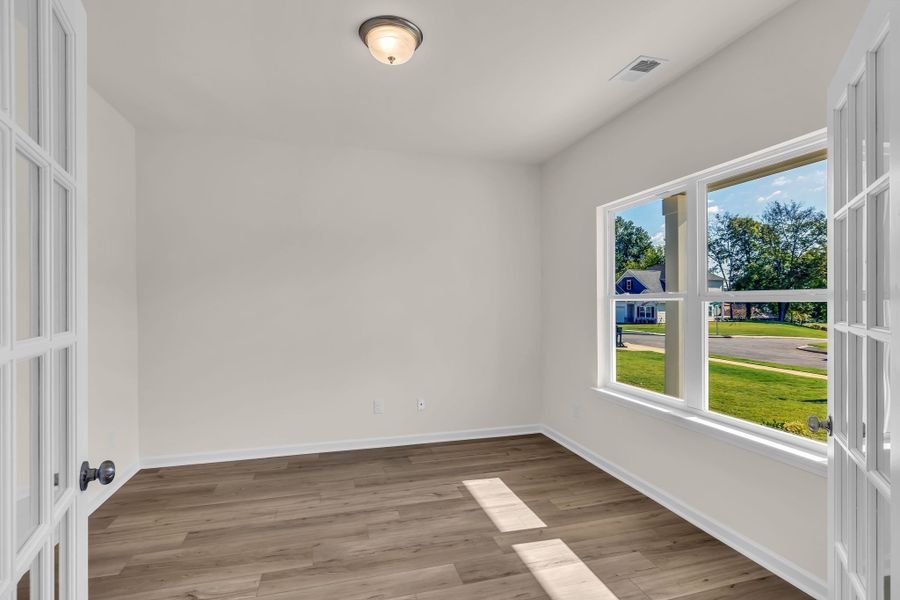 Large office space or could be used as a formal dining area. Large office space or could be used as a formal dining area.