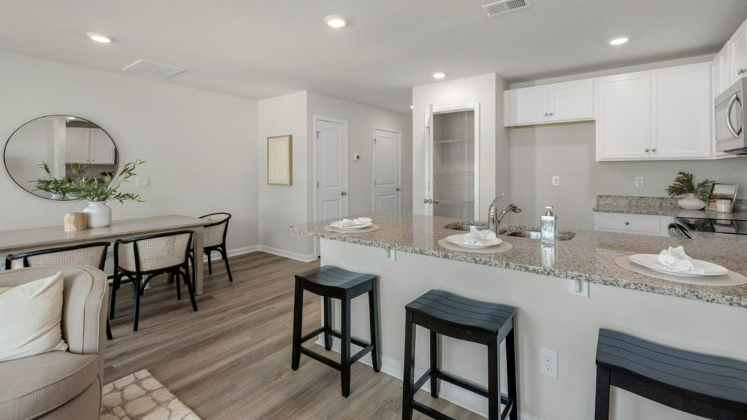 Representative furnished interior of a home built from the PEARSON TOWNHOME by D.R. Horton in Grayson Park Townhomes, Leland (Image 8).