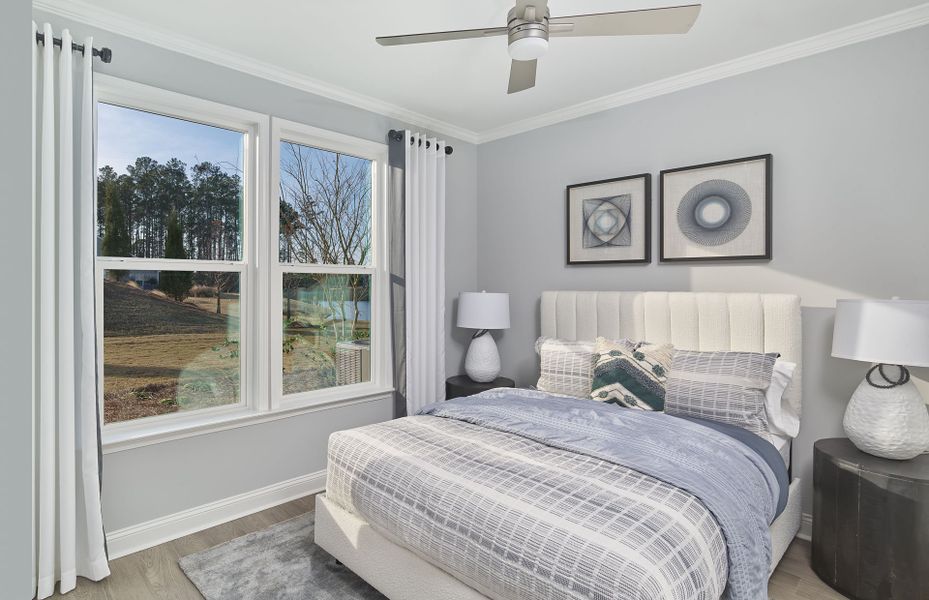 Spacious guest bedroom designed for privacy and relaxation. Spacious guest bedroom designed for privacy and relaxation.