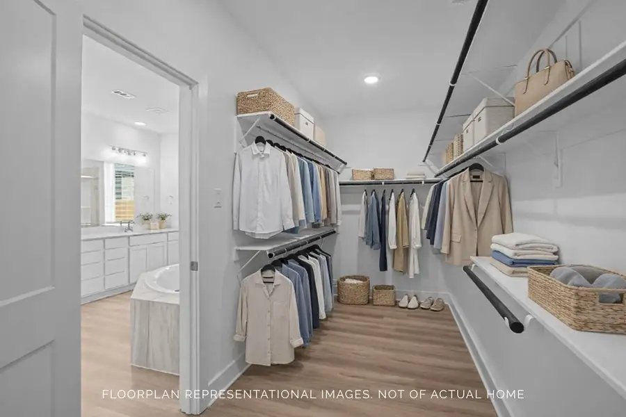Furnished interior view inside a new home in Sorella, Tomball (Image 6).