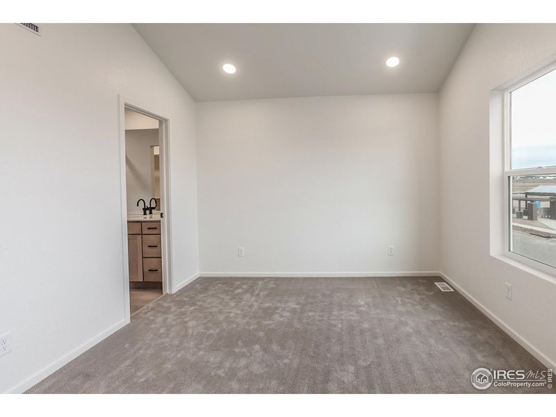 Spacious, unfurnished interior of a new home in Prairie Song Story Collection - Single Family Homes, Windsor (Image 32).