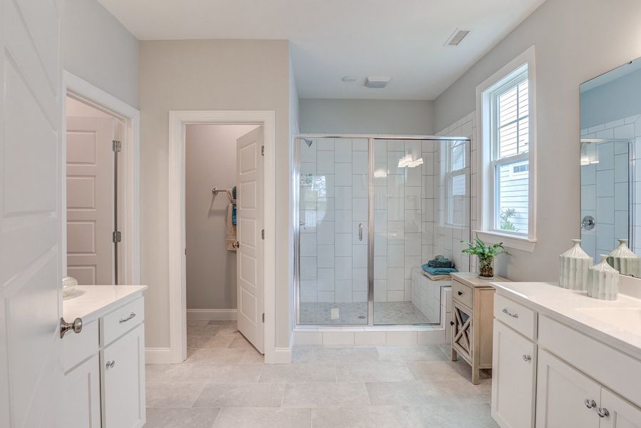 Representative furnished interior of a home built from the The Amherst by RobuckHomes in Windwater, Hampstead (Image 16).