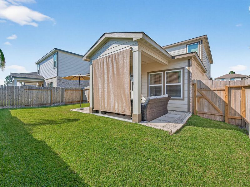 Exterior details and patio area of a home in Lakes at Black Oak, Magnolia (Image 23). Exterior details and patio area of a home in Lakes at Black Oak, Magnolia (Image 23).
