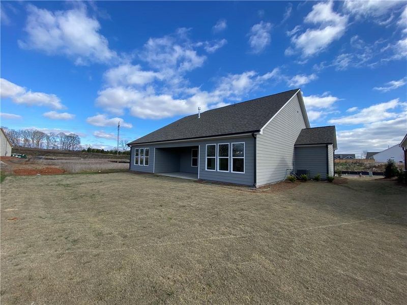 Front exterior of a new home in , Jefferson, GA, highlighting curb appeal (Image 27).